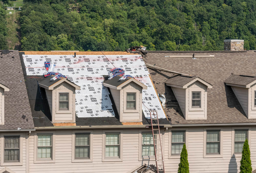 roofing contractor working on a customer's roof