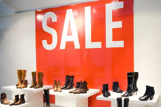 Shoe Store Apparel In Sale Season. Retail business sales and marketing apparel, CPG.